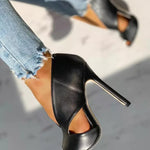 Black stiletto heels with peep-toe and sculpted cut-out design, high 11 cm heel
