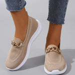 Beige knit slip-on sneakers with gold chain detail and white sole, available in white and black