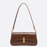 Brown vintage-style baguette bag with gold clasp and detachable shoulder strap designed for women by Sophia and Grace London
