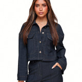 Dark blue cropped denim jacket with contrast stitching flap pockets and button closure designed for women by Sophia and Grace London