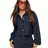 Dark blue cropped denim jacket with contrast stitching flap pockets and button closure designed for women by Sophia and Grace London