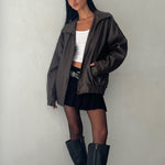 Oversized brown PU leather jacket with wide collar and elasticated hem designed for women by Sophia and Grace London in bitter chocolate tone