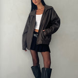 Oversized brown PU leather jacket with wide collar and elasticated hem designed for women by Sophia and Grace London in bitter chocolate tone