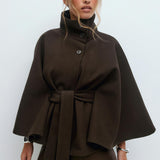 High-neck wool blend cape coat for women with belted waist, available in camel, ivory, navy and espresso brown